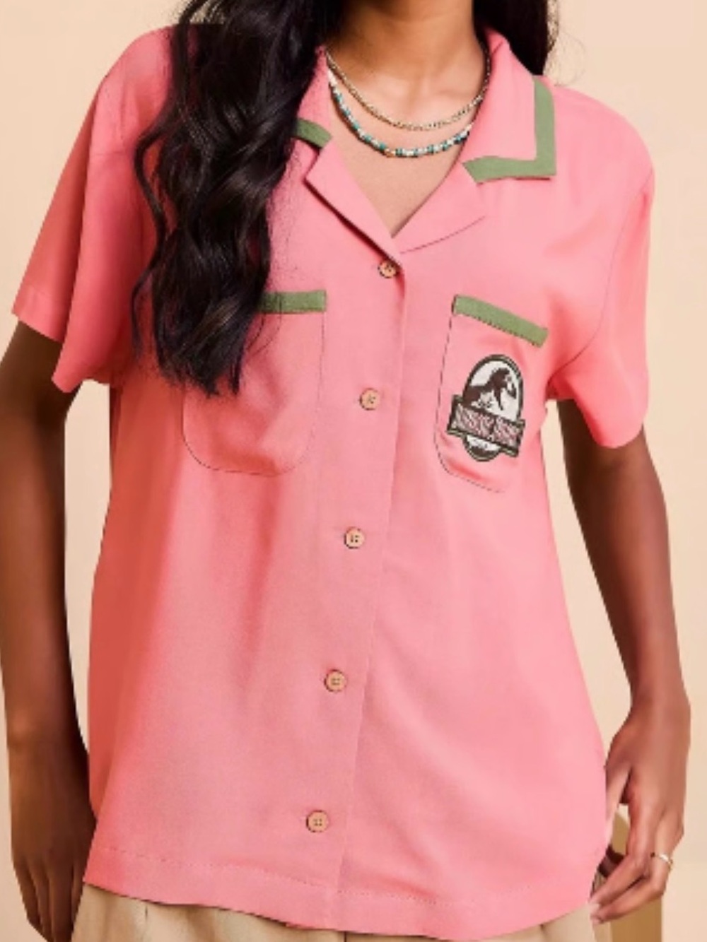 Jurassic Park Floral Logo Women’s Slightly Cropped Woven Button Up.